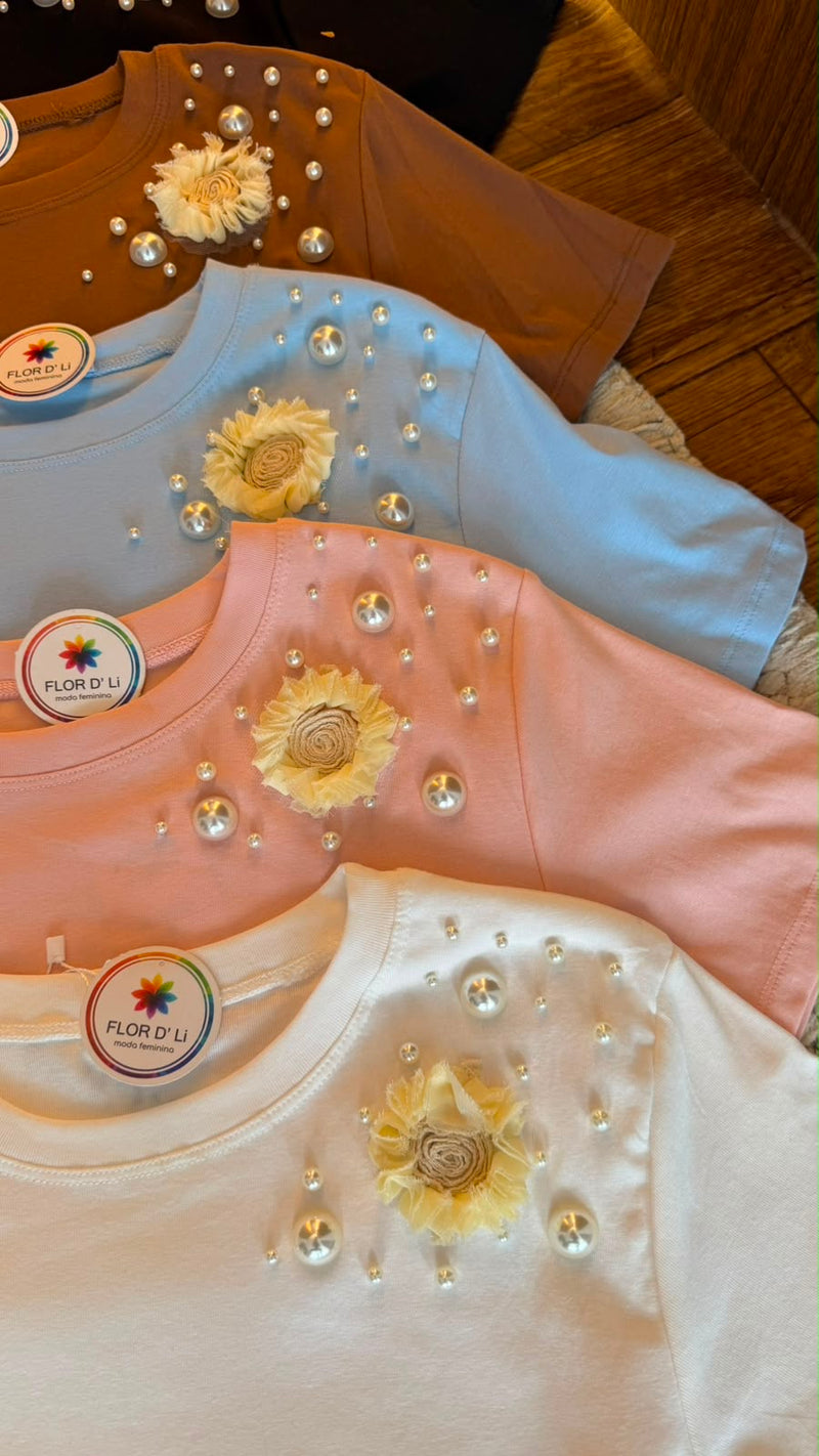 Blusas c/detalhe flor