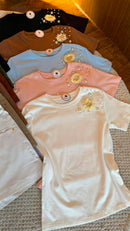 Blusas c/detalhe flor